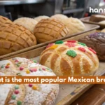 What is the most popular Mexican bread? Freshly baked Conchas and Pan de Muerto with colorful sugary toppings.