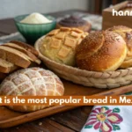 What is the most popular bread in Mexico – A close-up of freshly baked conchas, bolillos, and pan de muerto showcasing the diversity of Mexican bread.